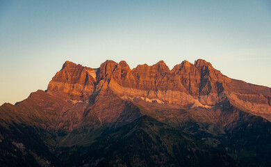 Naklejka premium Les Dents de Midi, Swiss Alps, during the sunset on a day of summer