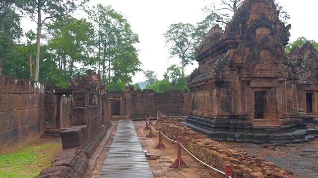 Move out from a close up of an ancient Angkorian temple doorway lintel at Banteay Srey, Siem Reap, Cambodia. This is an Angkorian site near Angkor Wat, Cambodia