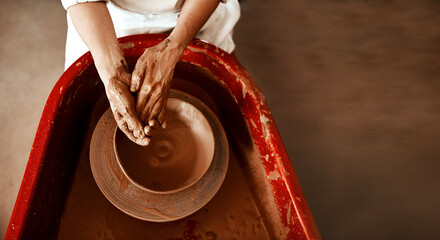 Top view, hands and pottery in workshop for production, art deco and development for startup. Clay, artistic person and creativity or talent in small business for project and sculpture for retail