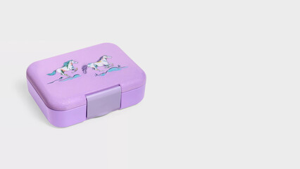 Closeup of small bento lunchbox isolated on copy-space background.