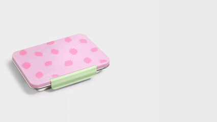 Closeup of small bento lunchbox isolated on copy-space background.