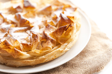 Sweet pie, homemade pastries on a light background. Selected focus. Close-up.
