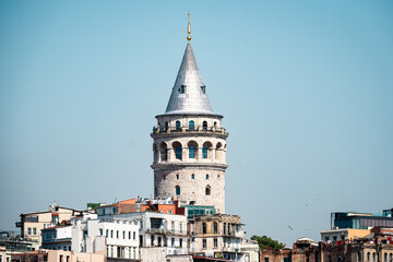 Fototapeta premium Istanbul, Turkey - June 2024: Iconic Galata Tower Overlooking the Historic and Modern Skyline of Istanbul
