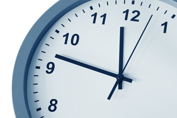 Close-up of hands on clock face