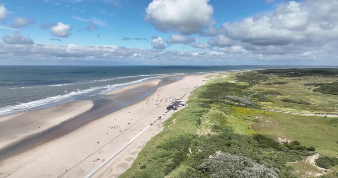 Beach , sea and dunes of Zeeland, The Netherlands in summer time. Aerial drone view.