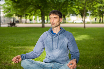 joyful cheerful middle-aged man in nature on a warm sunny day