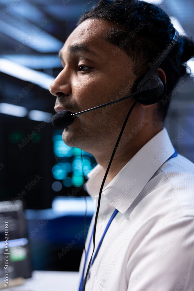 Poster data center agent supporting engineering team doing hardware maintenance, talking in headset microph