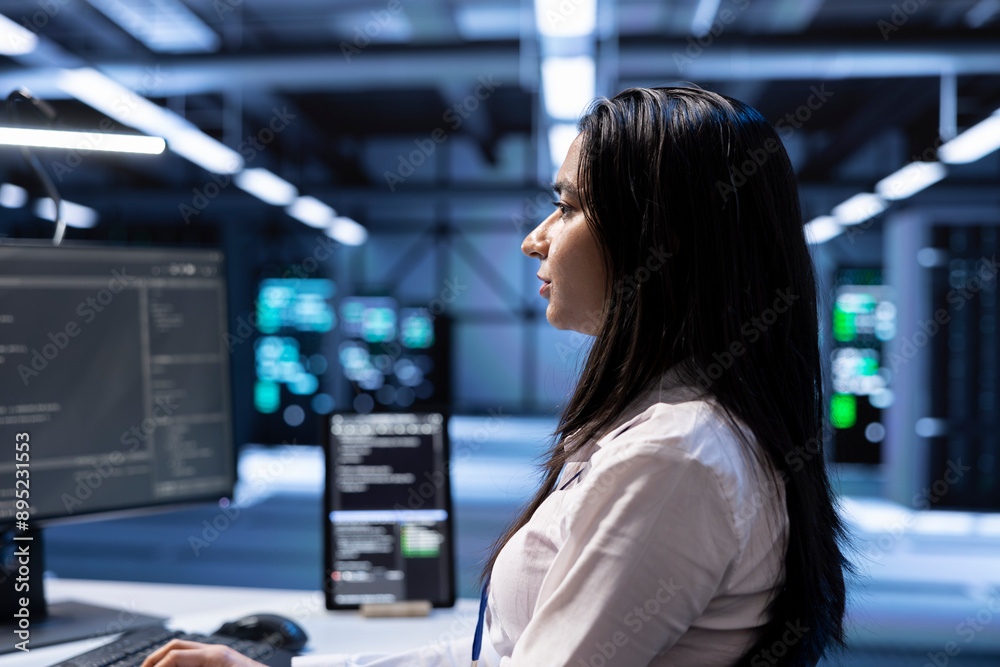Poster admin in server hub checking recovery plan, monitoring data center energy consumption across compone