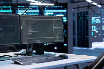 Computers in data center facility used for managing rackmounts energy consumption. PCs in high tech...