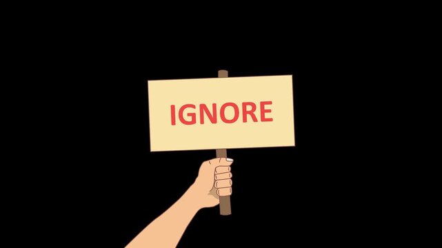 a hand holding a sign with ignore text