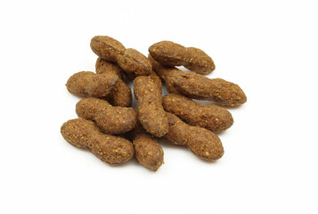 Peanut butter and chocolate dessert snack. Pile of peanut shaped food