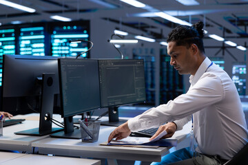 Engineer maintaining accurate documentation of data center infrastructure, configurations, and...