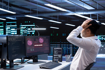 Technician in server hub doing face palm gesture, trying to protect hardware from hacker stealing...