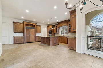 Images of Kitchen with cabinets island appliances cooking and baking