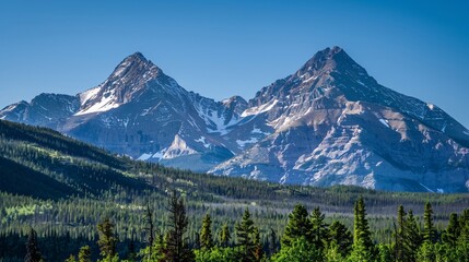 Obraz premium The rugged peaks of mountains rising above the treeline, their slopes covered in a patchwork of forest and bare rock, showcasing the grandeur of nature.
