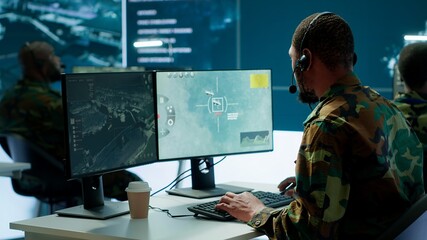 Army intelligence specialist utilize advanced computer systems, surveillance technology and data to...