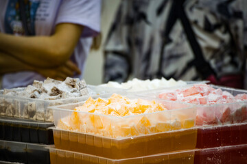 a variety of traditional pastries neatly arranged in a steamer