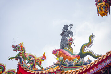 Fototapeta premium the traditional Taiwanese tile roofs, with their rich orange color and intricate craftsmanship