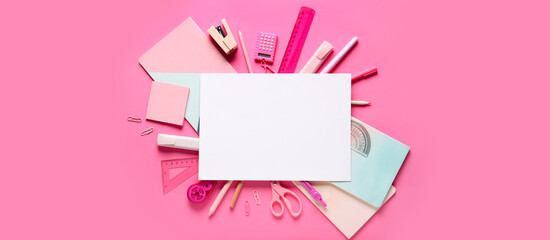 School supplies with paper sheet on pink background. Top view