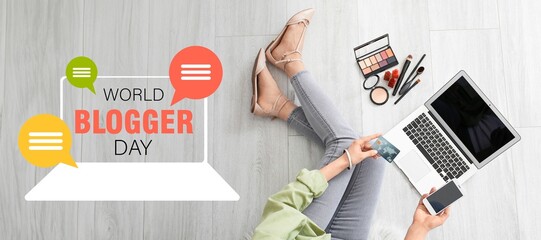 Banner for World Blogger Day with female makeup artist with laptop, mobile phone and cosmetics