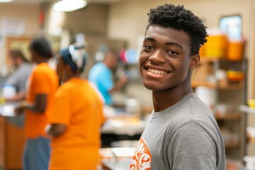 Fototapeta premium Young African American male volunteer at community center