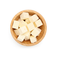 Wooden bowl with delicious cut feta cheese on white background