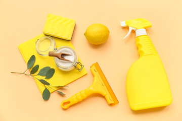 Composition with natural products for cleaning, duster and sponge on color background
