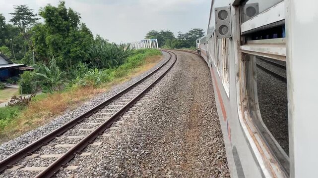Beautiful view when the train passes over the bridge on curved tracks