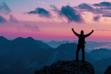 Silhouette of a person on a mountain peak at sunset, with a vibrant pink and purple sky.