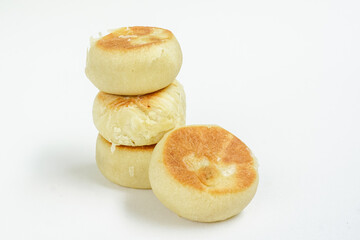 Bakpia is a food and souvenir typical of Yogyakarta made from a mixture of red beans or mung beans or cheese or yam coated with flour. That is an acculturation of Chinese culture. Isolated on white.