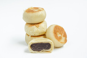 Bakpia, Bakpia Pathok kumbu hitam is a food and souvenir typical of Yogyakarta made from a mixture of red beans coated with flour. Isolated on white