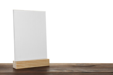 Menu holder on wooden table against white background. Space for text