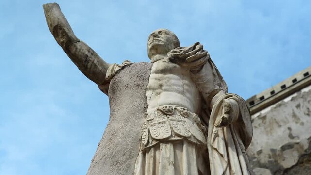 Ancient remains of marble Roman statue of Marcus Nonius Balbus in the court yard of Herculaneum.