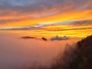 Fototapeta premium Beautiful cloudy sunset landscape view with horizon mountains.