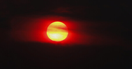 Obraz premium sunset back on silhouette dark red orange evening cloud on the sky.beautiful landscape