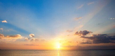 Beautiful sunset over the sea. Panoramic view of the sea.