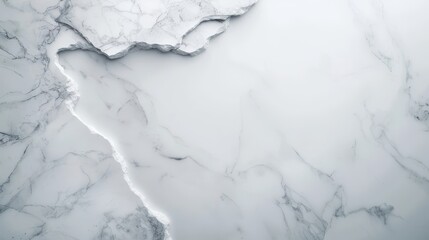 Obraz premium A white marble countertop with a crack in it