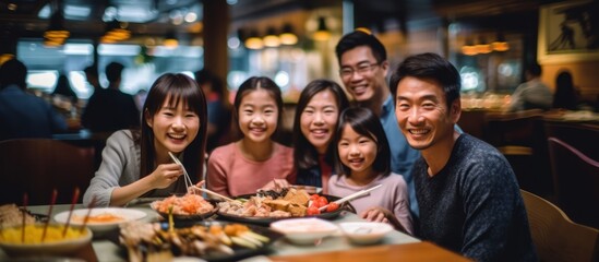 Obraz premium Family Dinner at a Restaurant