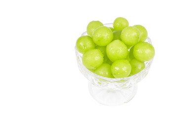 Fresh Shine Muscat grapes filled in a dessert bowl. white background - vitis vinifera 'shine muscat'