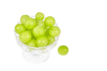 Fresh Shine Muscat grapes filled in a dessert bowl. white background - vitis vinifera 'shine muscat'