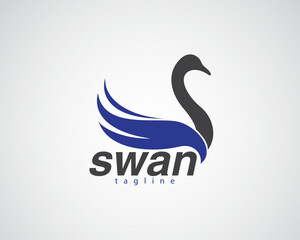 creative swan with wings that form a wave logo design