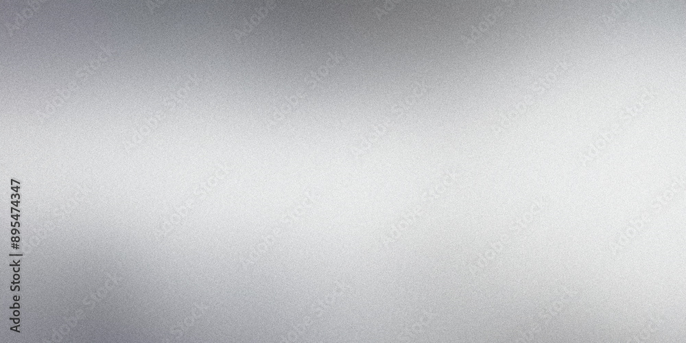 Wall mural abstract background with copy space created by light reflecting on a grainy metallic surface