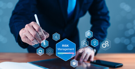 Risk Management Mastermind: Businessman Analyzes on Tablet