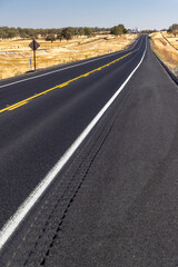 Fototapeta premium Asphalt road and countryside landscape