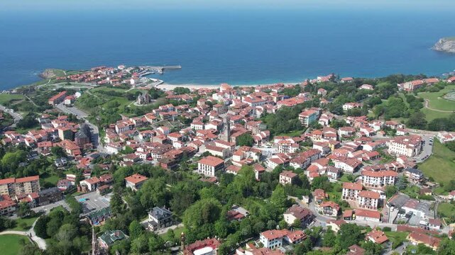 4K aerial drone view of Comillas town in Cantabria, northern Spain. High quality 4k footage