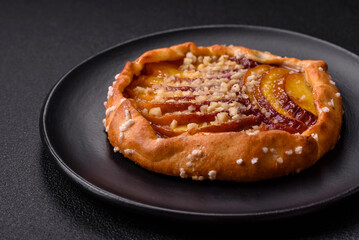 Delicious sweet crispy galettes with fruits and cinnamon