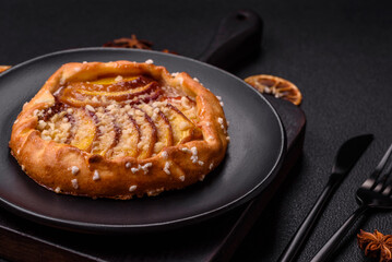 Delicious sweet crispy galettes with fruits and cinnamon