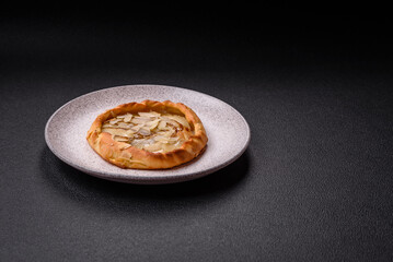 Delicious sweet crispy galettes with fruits and cinnamon