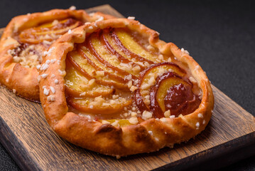 Delicious sweet crispy galettes with fruits and cinnamon