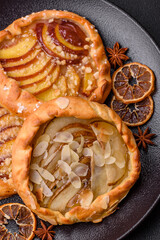 Delicious sweet crispy galettes with fruits and cinnamon